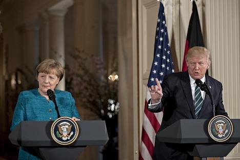 Trump y Merkel (Foto: Bloomberg)