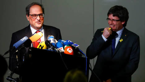 Quim Torra y Carles Puigdemont: todo es posible en España. (Foto: El Confidencial).